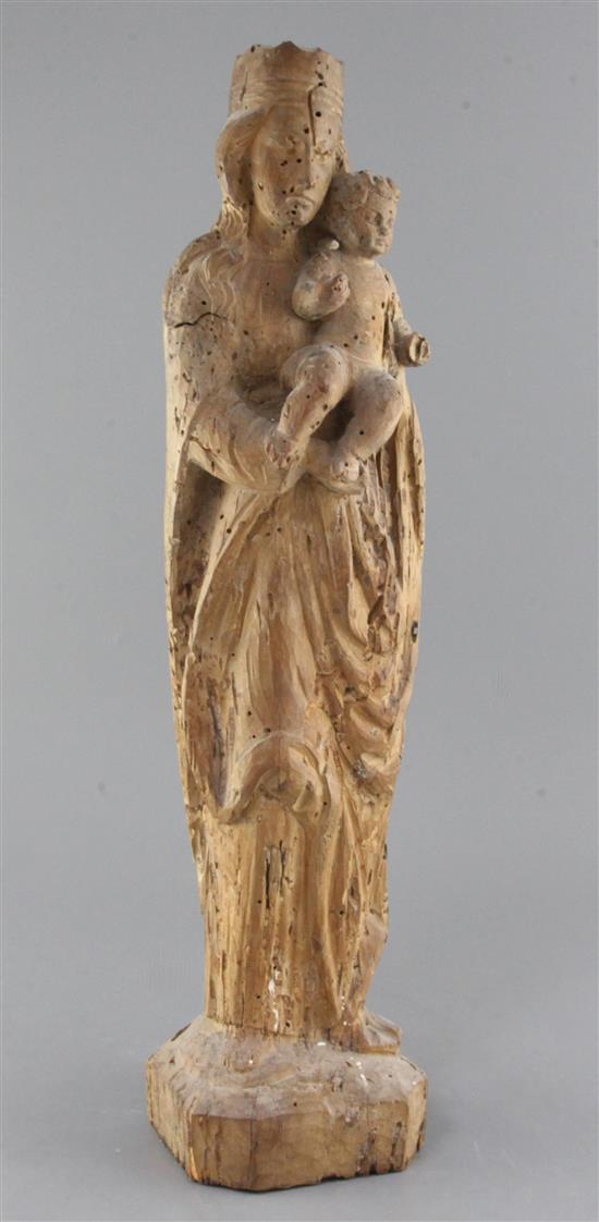 A 16th century Tyrolean carved pine group of the Madonna and Child, 23in.